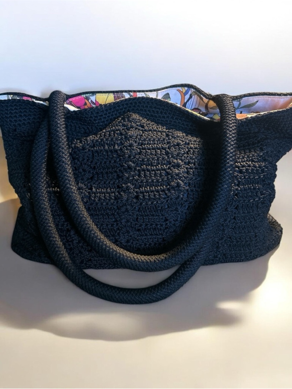 The Sak Black Crochet Tote with Floral Lining